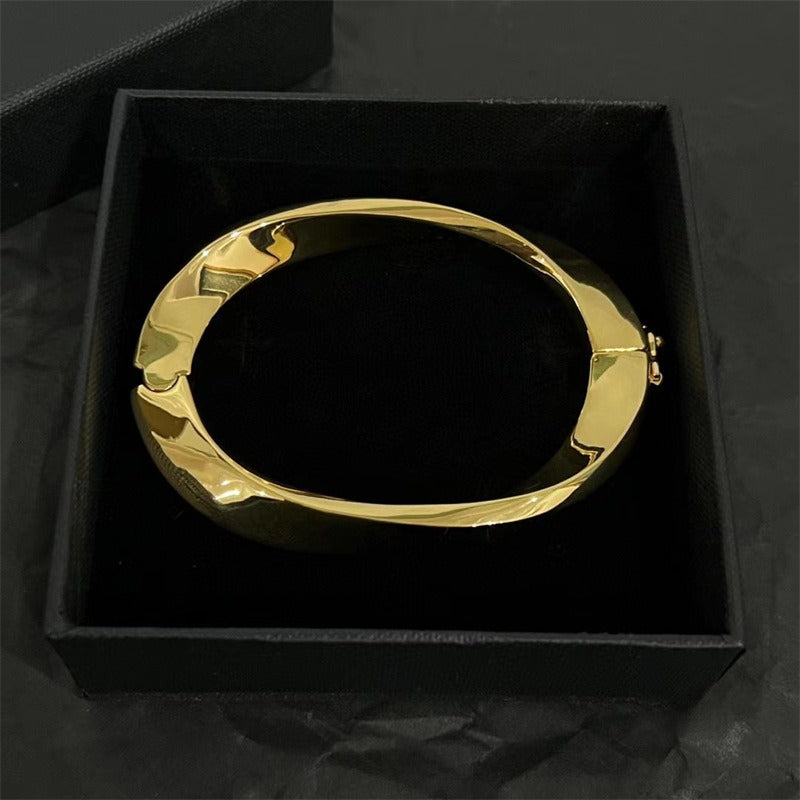 Irregular oval bracelet futuristic and unique design